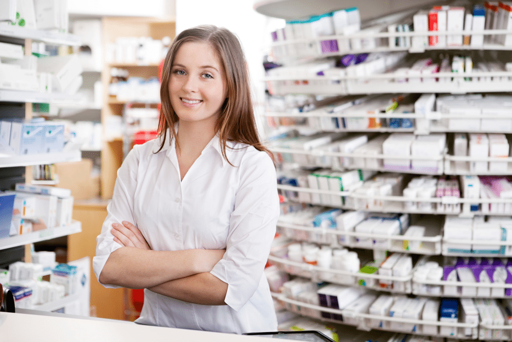 woman standing on a pharmacy