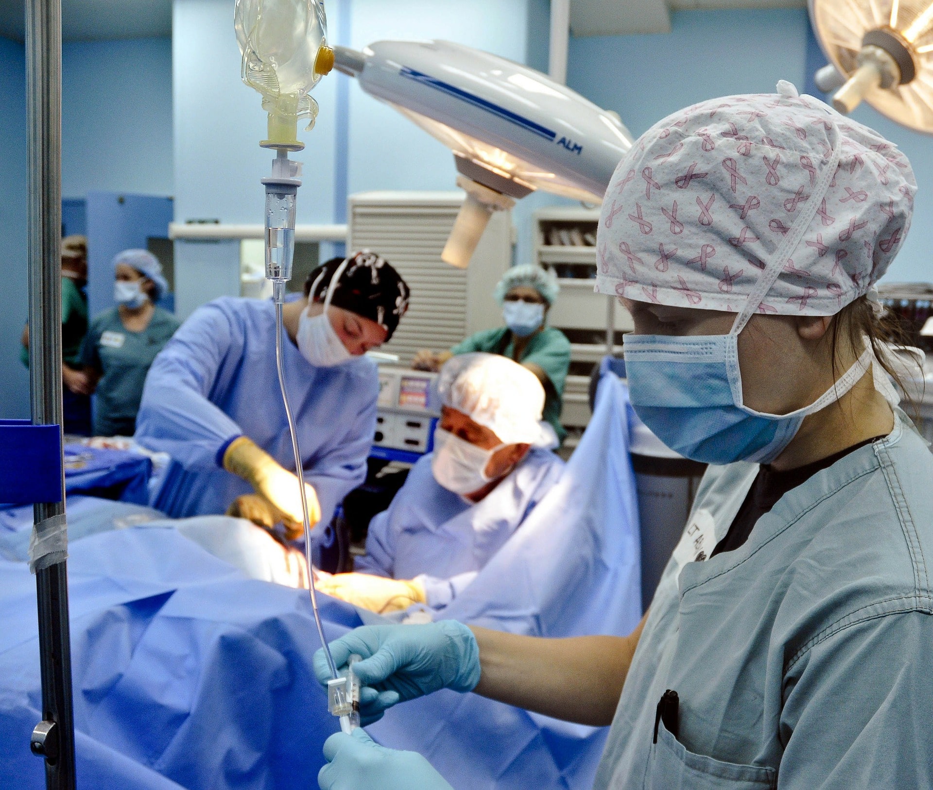 Nurses and doctors working in a operating room