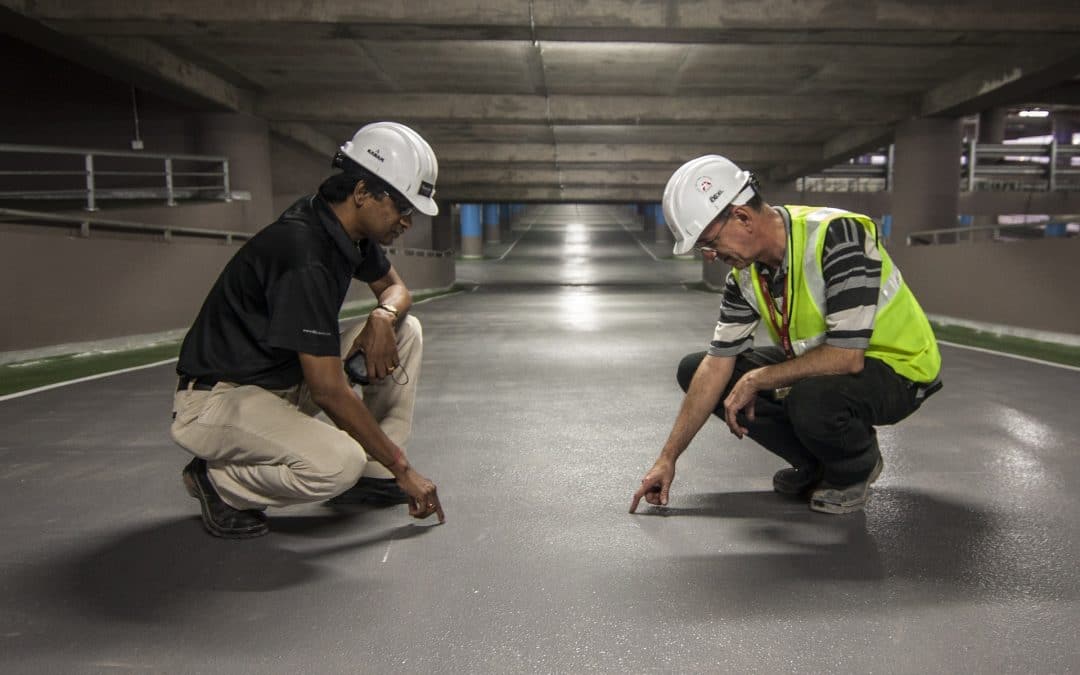 Civil engineers measuring the road