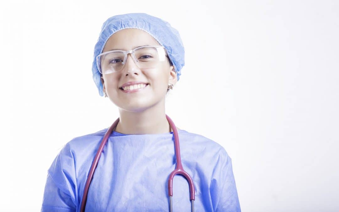 Smiling nurse wearing a operating gown